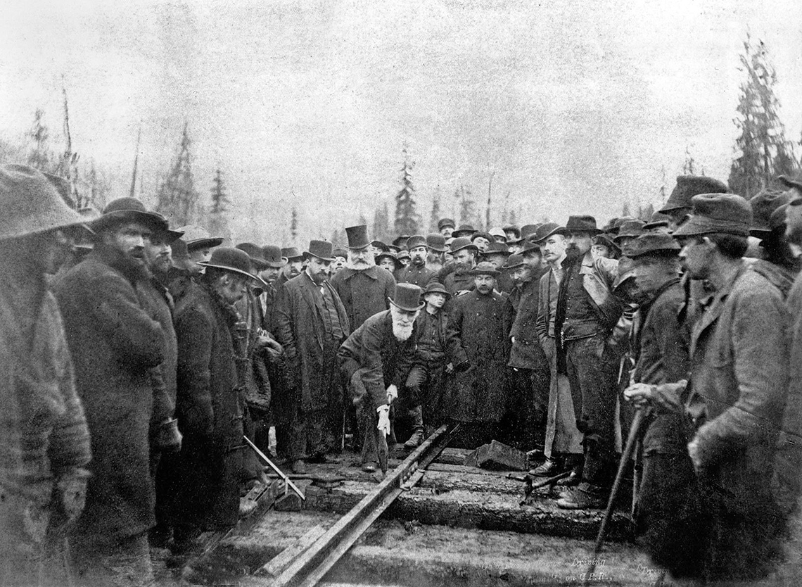 November 1885: Lord Strathcona puts the last spike completing the CPR. Only white men in the photo.