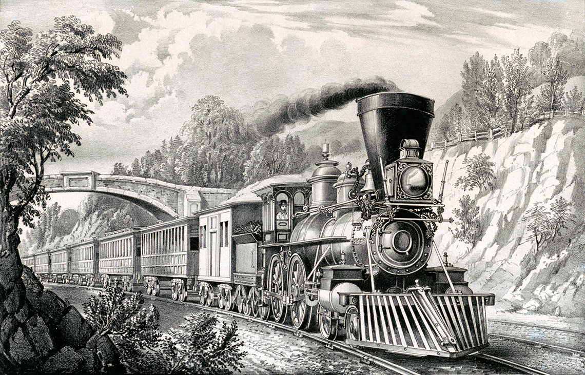 A train on tracks with steam coming out of it.
