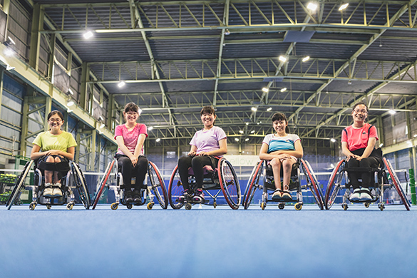 Being physical Adaptive tennis players smiling.