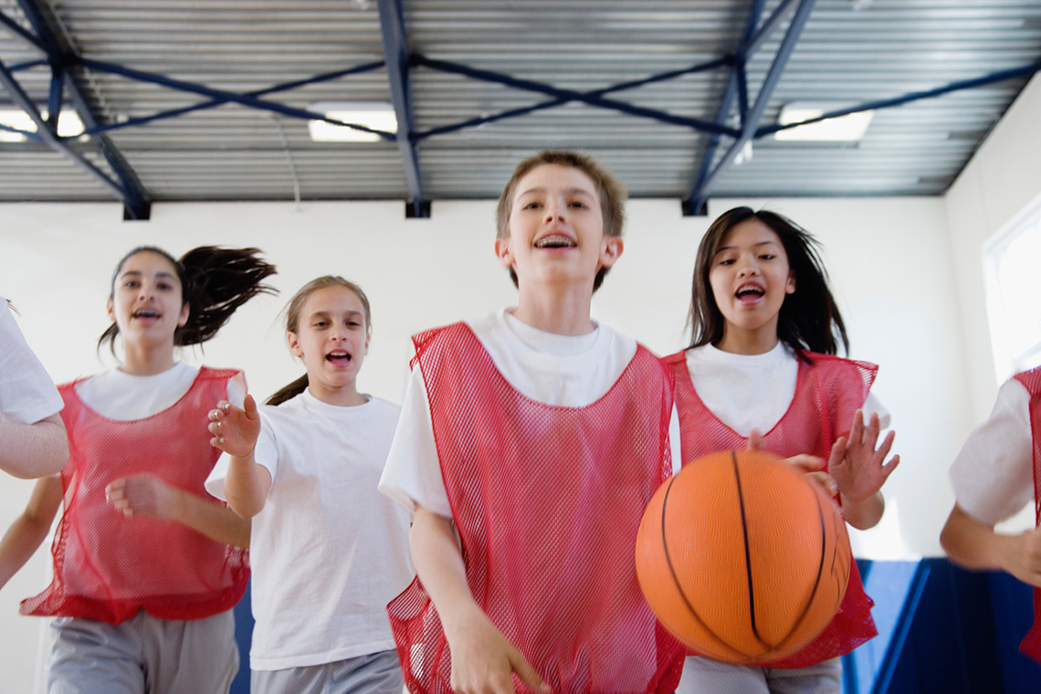 Kids playing basketball