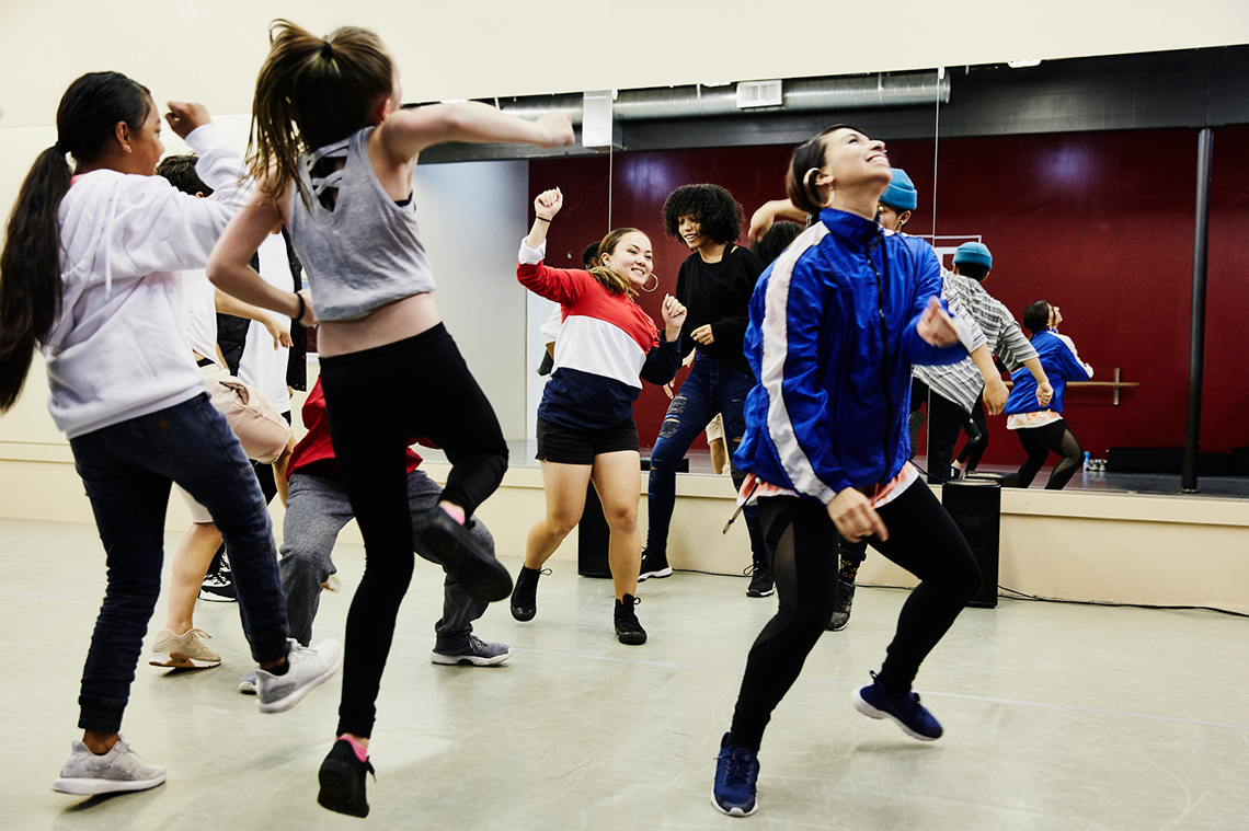 Children dancing to music.