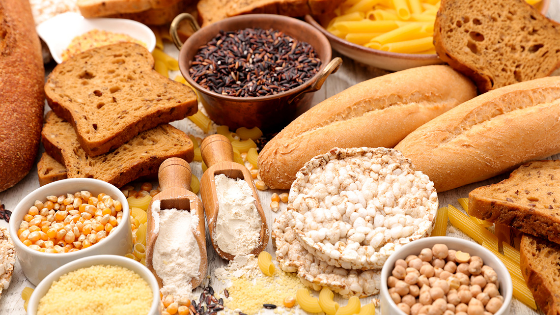 Whole grains, including corn, pasta, breads, rice, and flour.