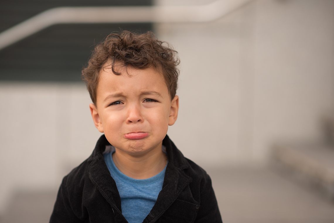 A child who looks like they are about to cry.
