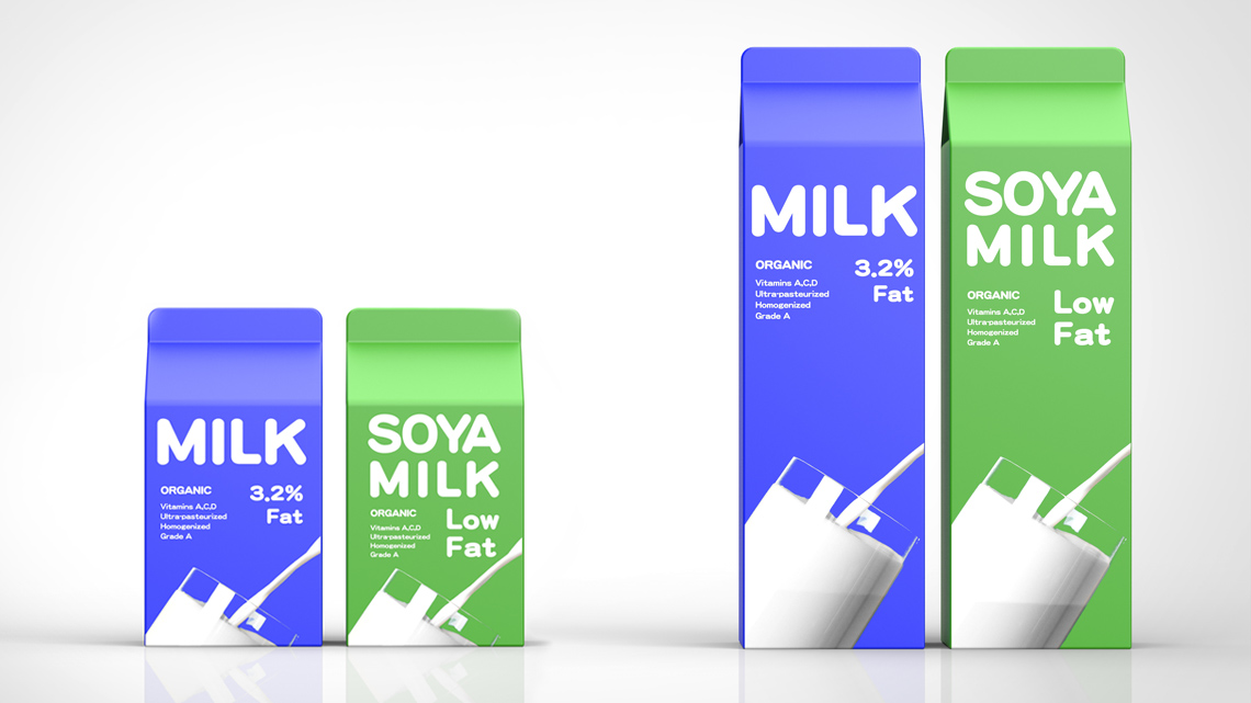 Small and large cartons of regular milk and soy milk.