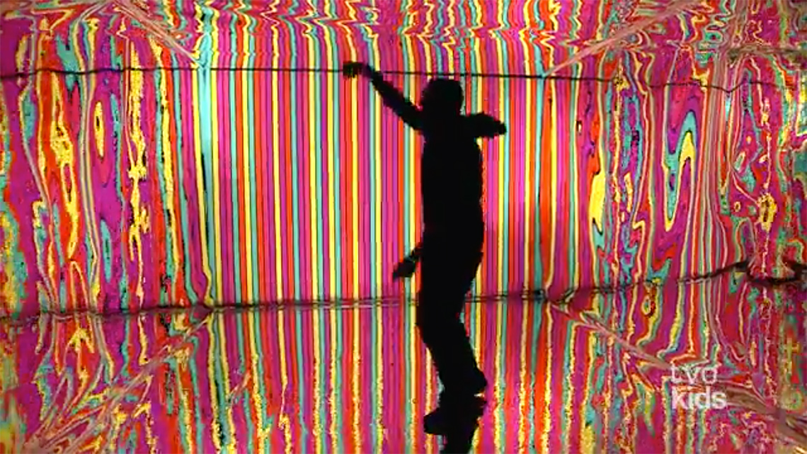 A silhouette of a person dancing.
