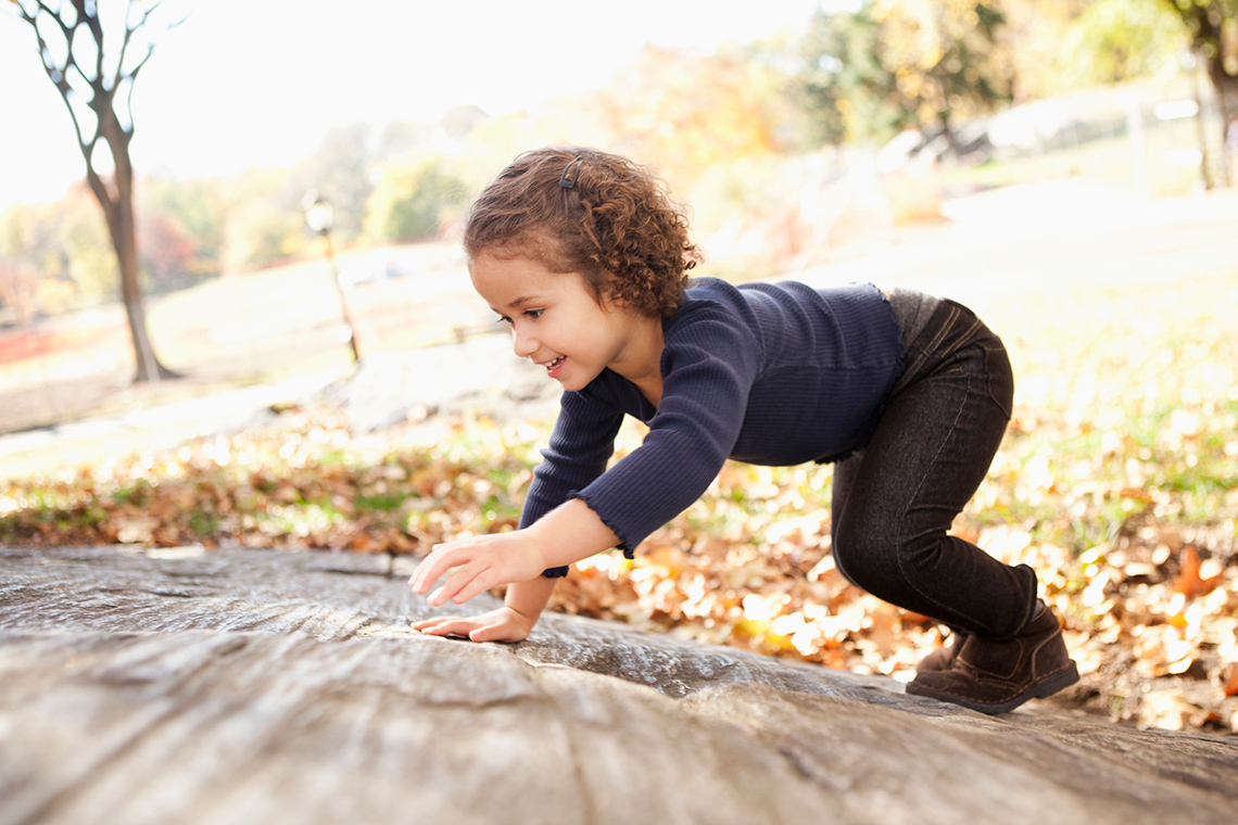 A child is crawling.