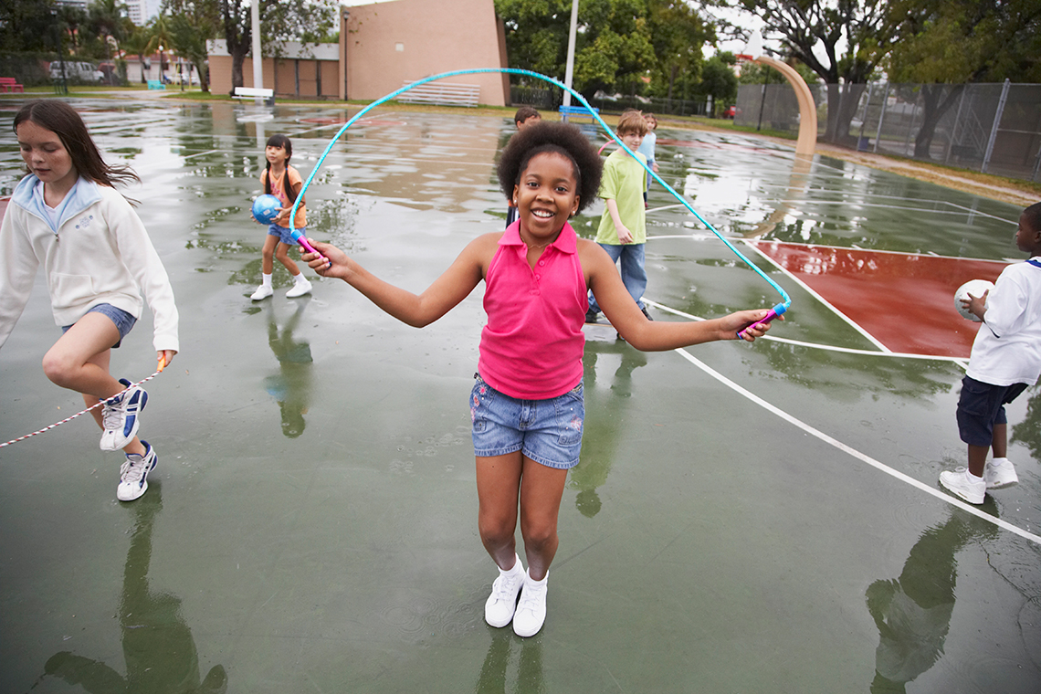A girl is jumping rope.