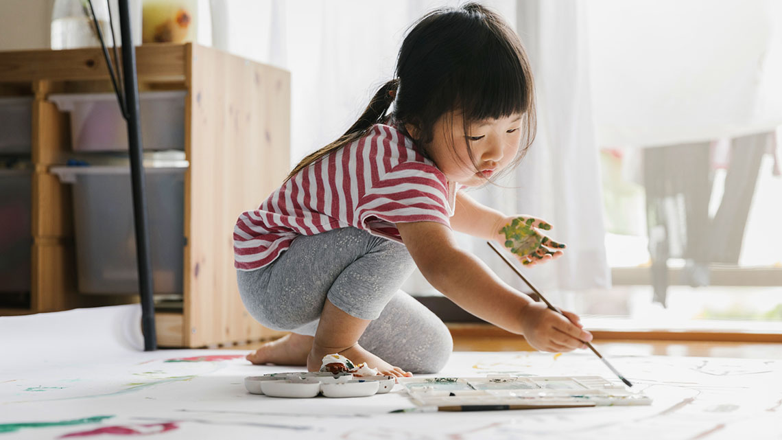 Young child painting