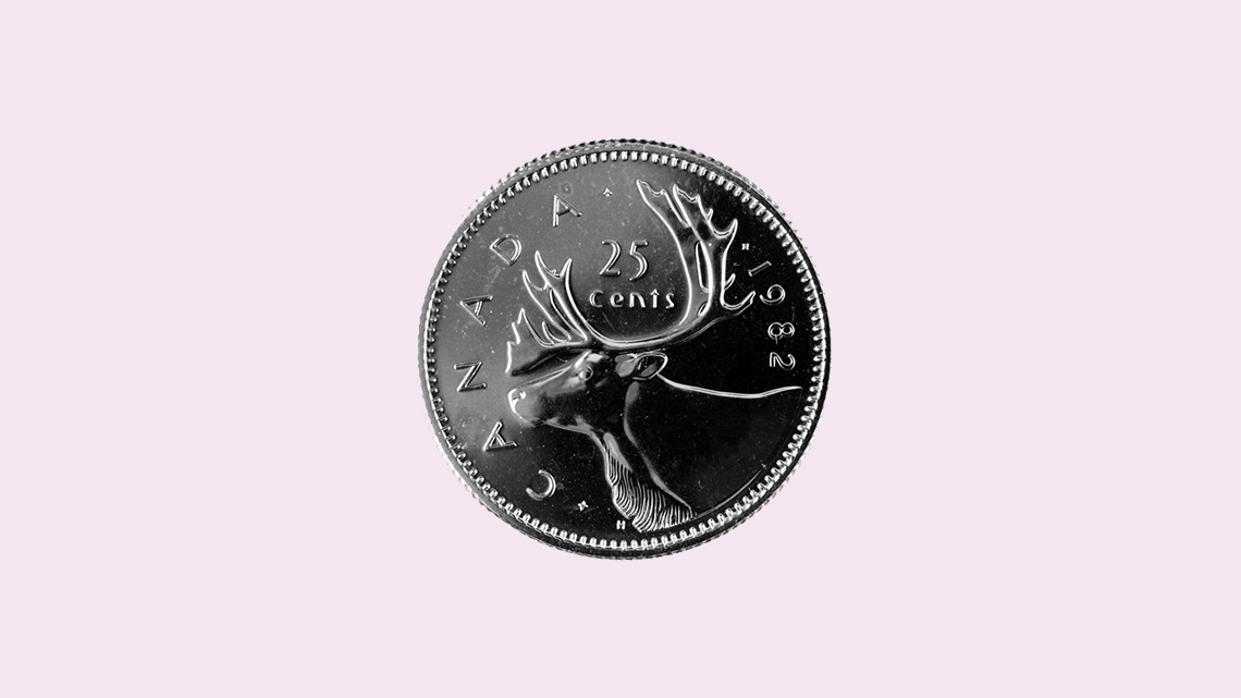 A silver-coloured coin with a caribou. This is a 25 cent coin called a quarter.