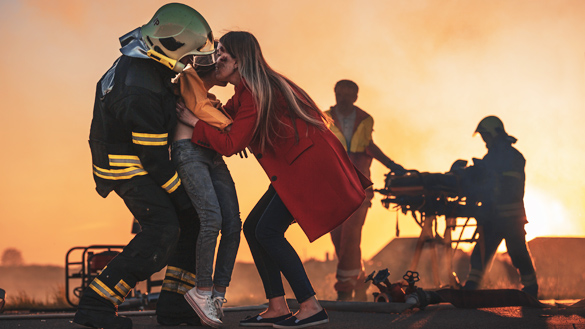 A person being saved from a fire