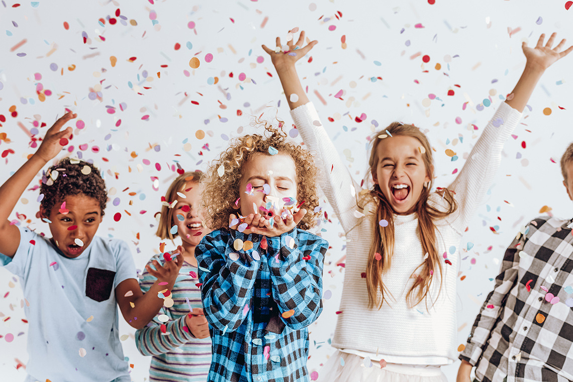 A group of kids celebrating
