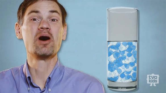 An image from “Oil and Water.” Damian raises his eyebrows as he communicates as if he is surprised.