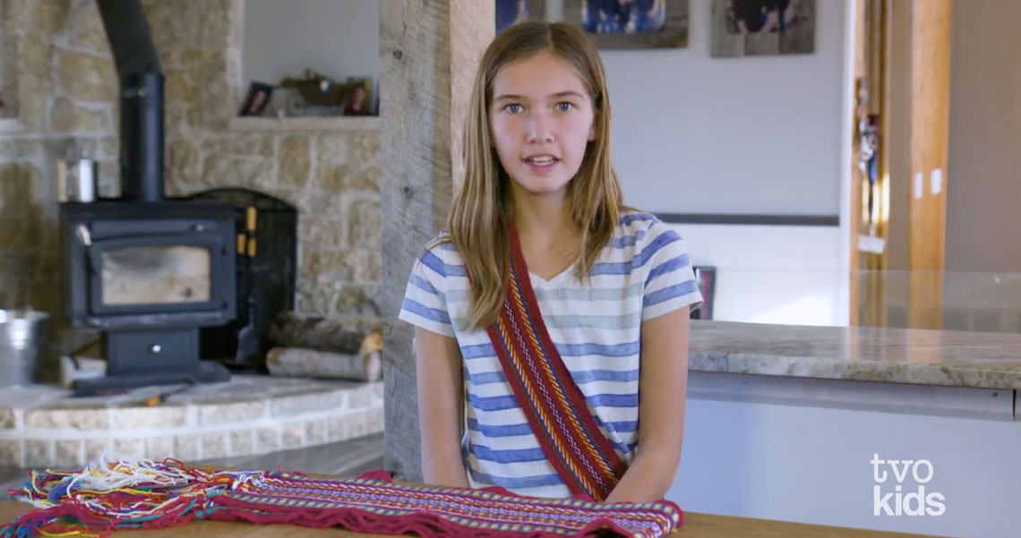 A student wearing a métis sash