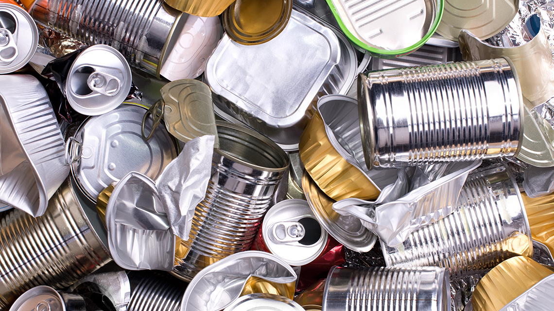 A collection of different metal cans that have been cleaned and prepared for recycling.