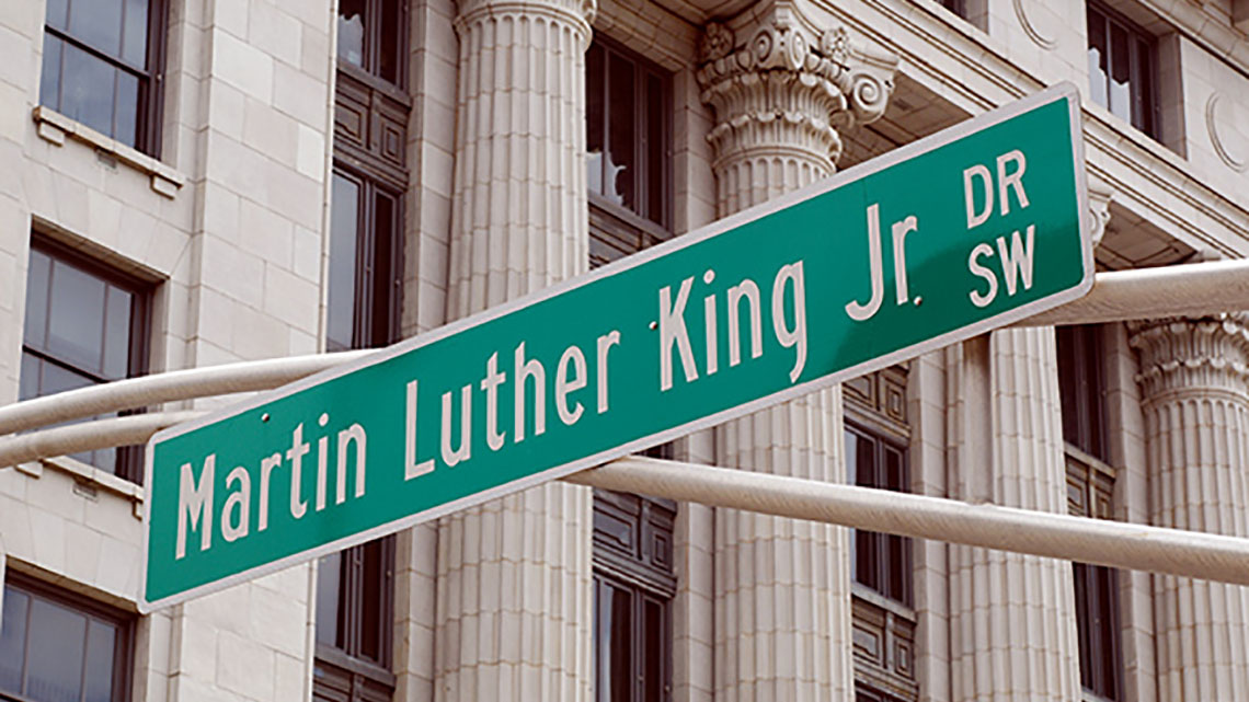 View of street sign with words “Martin Luther King Jr. Drive SW”