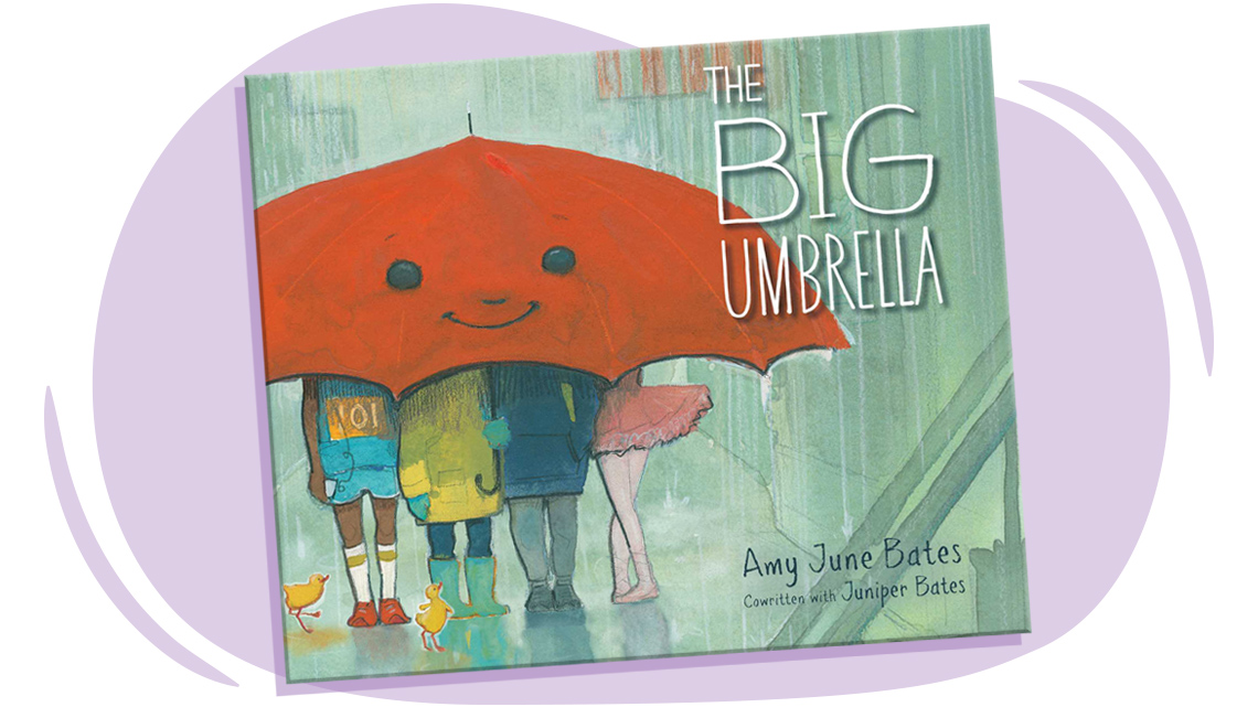 Large, red umbrella with many people underneath it.