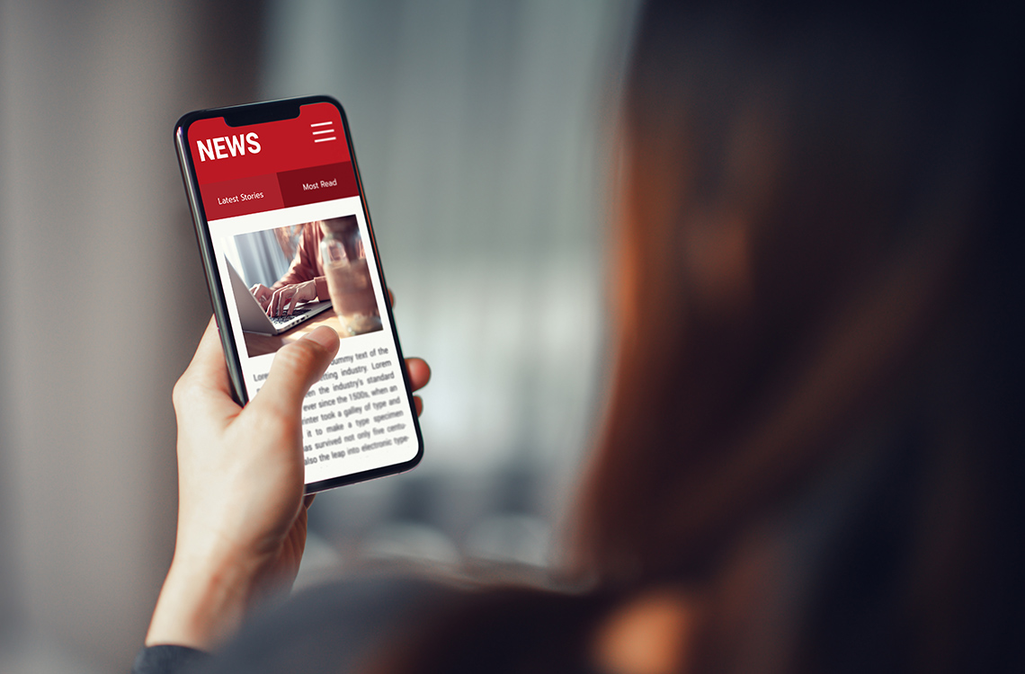 Person reading the news.