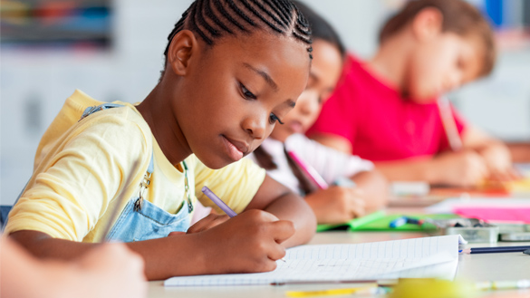 Young students doing classwork