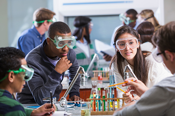 teens in a science experiment
