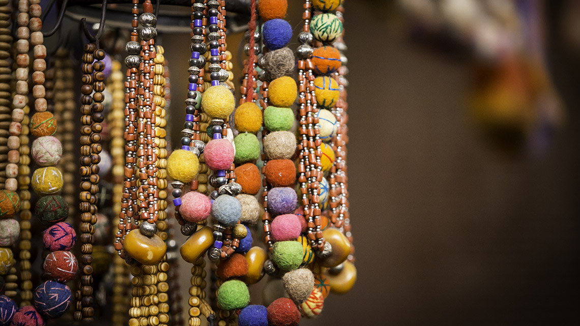 Necklaces with various patterns of beads.