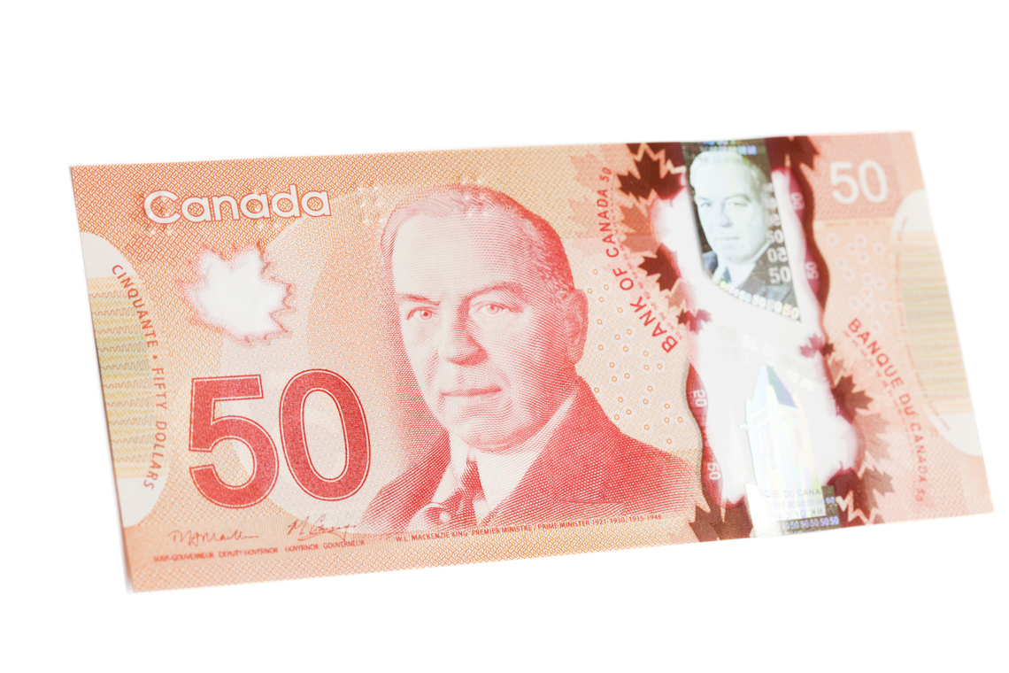 A 50-dollar Canadian Bill. The bill has a 50 on the front and a picture of Prime Minister William Lyon Mackenzie King.