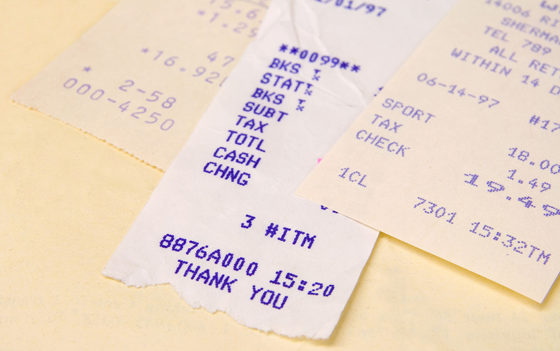 A pile of different kinds of receipts.
