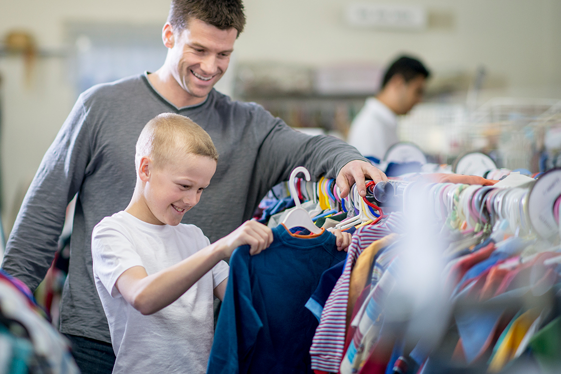 Father and son shopping for clothes
