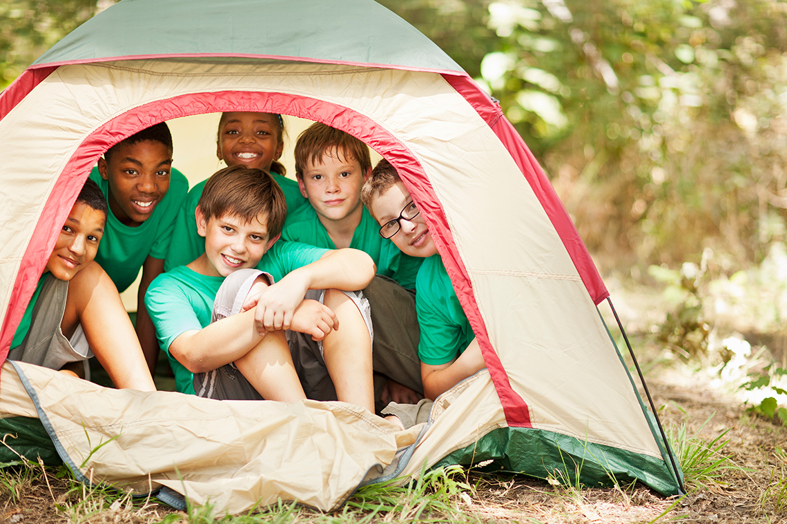 Group of kids in a tent