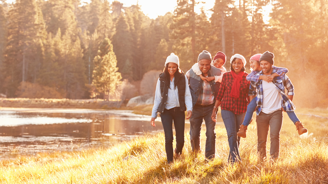 Six family members going on a hike.