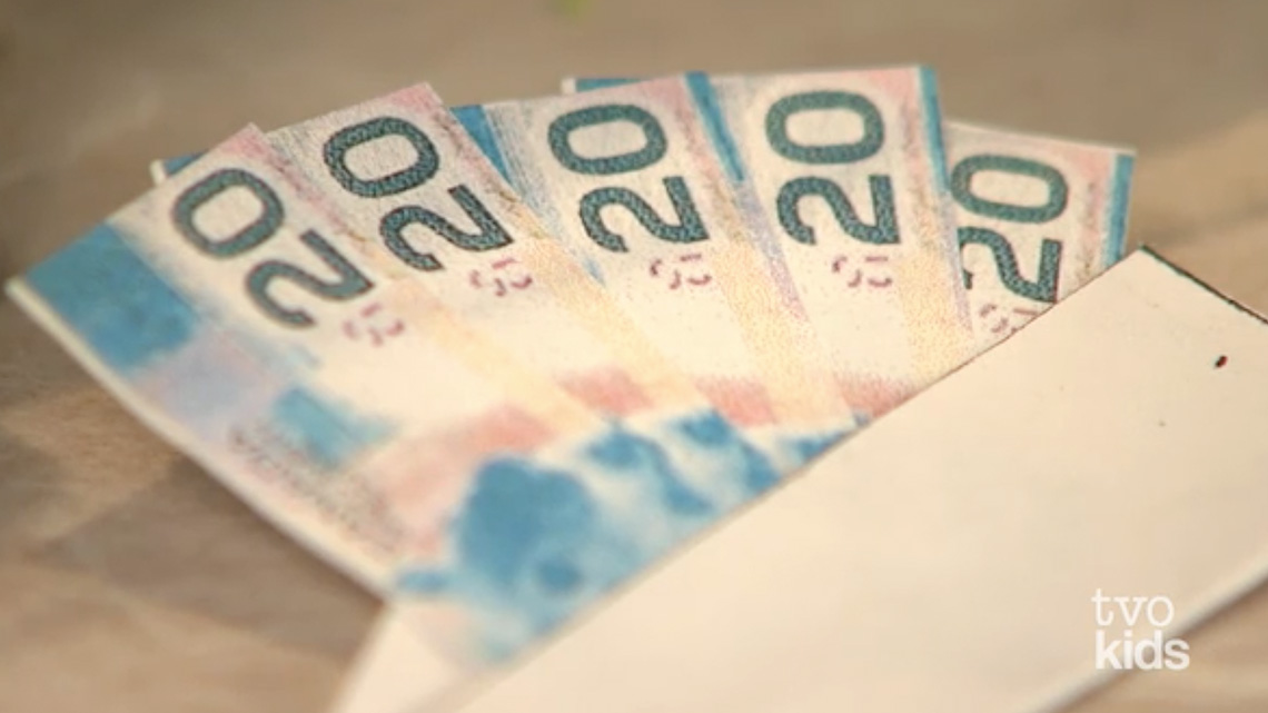 There are five twenty-dollar bills in an envelope.
