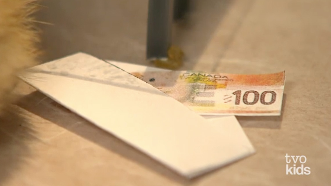 There is a single hundred-dollar bill in an envelope.
