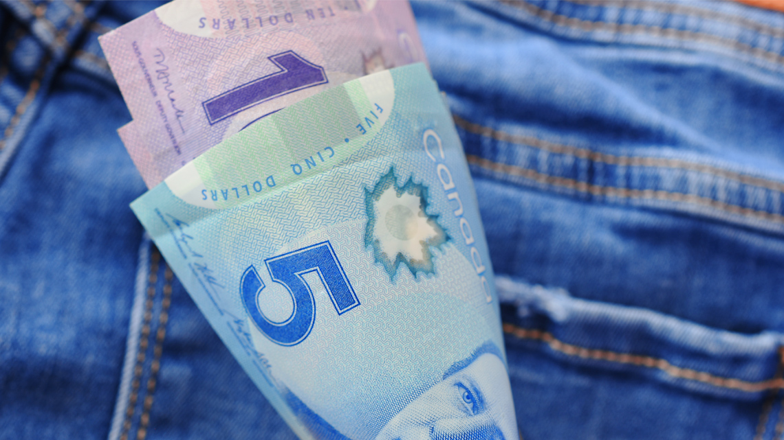 A Canadian five dollar bill.