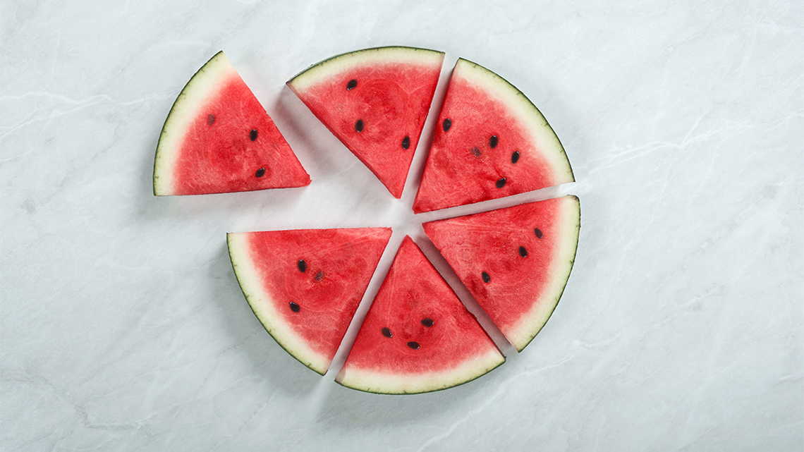 Watermelon cut into six equal size wedges.