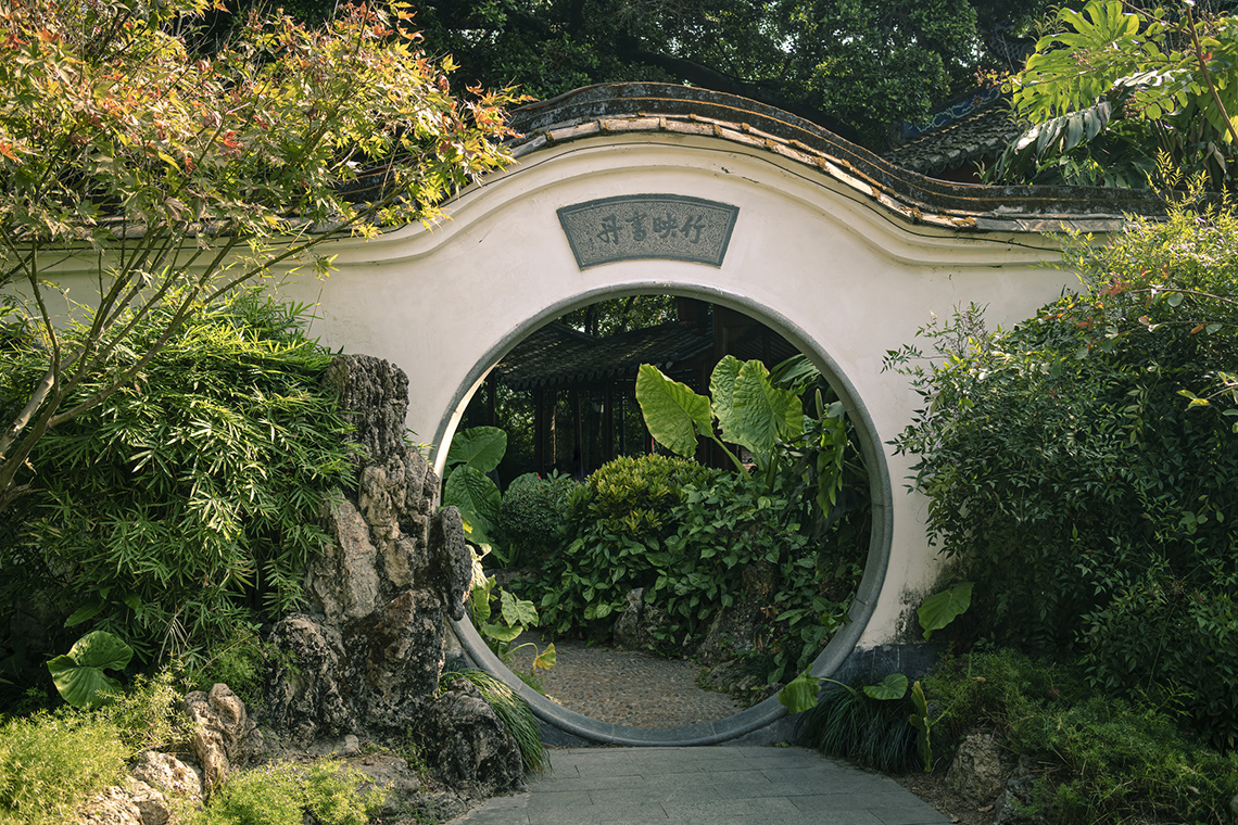 A doorway that is in the shape of a circle.