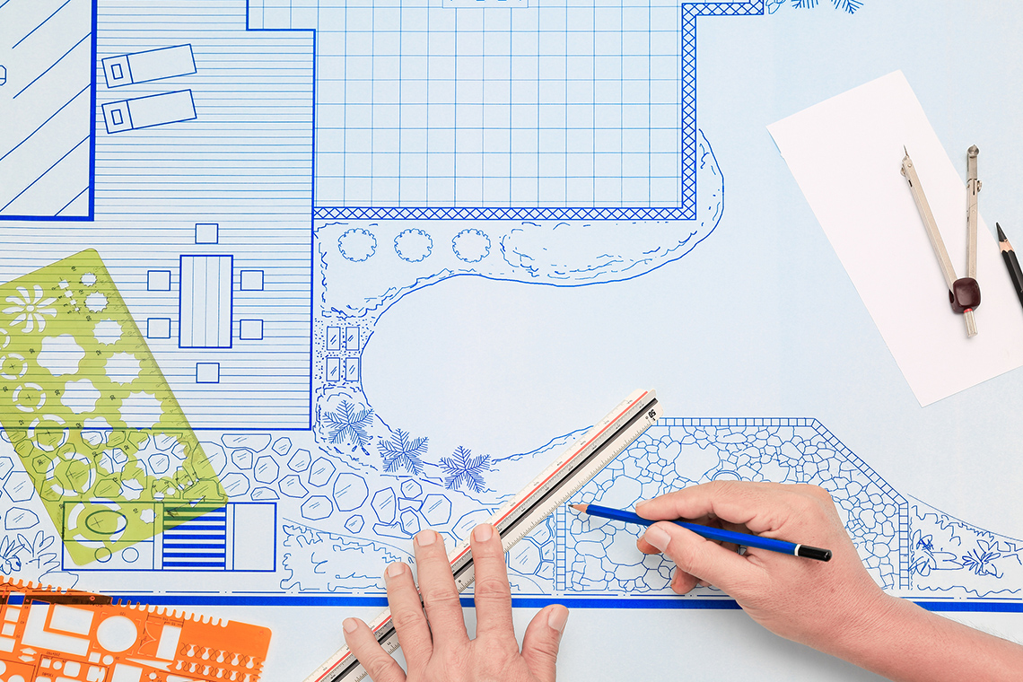 Blueprint plan for a backyard pool and deck.