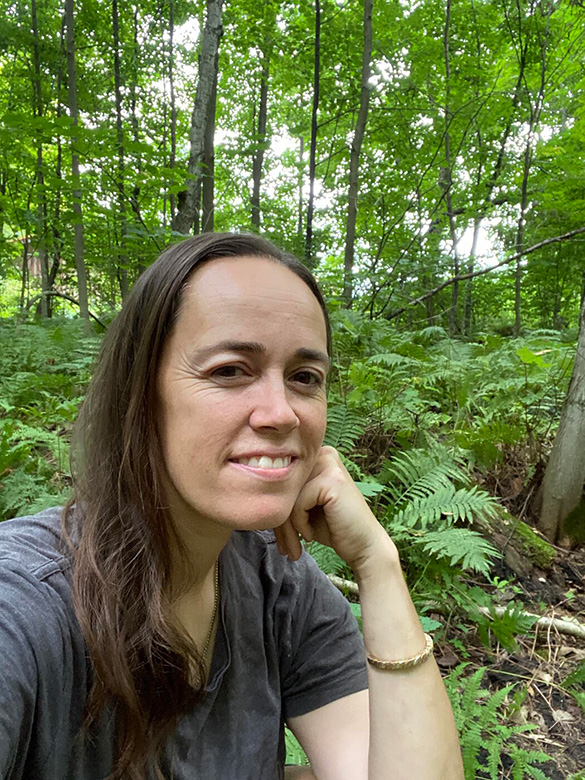 Anong Beam sitting in the forest.