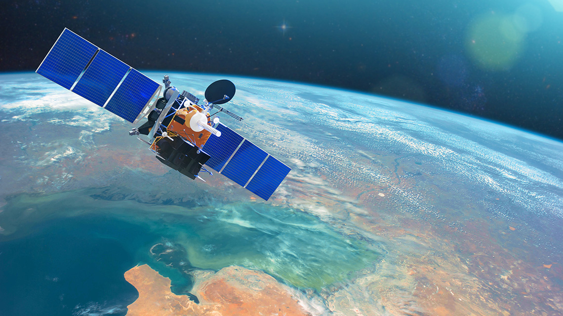 A satellite in low orbit around the Earth.