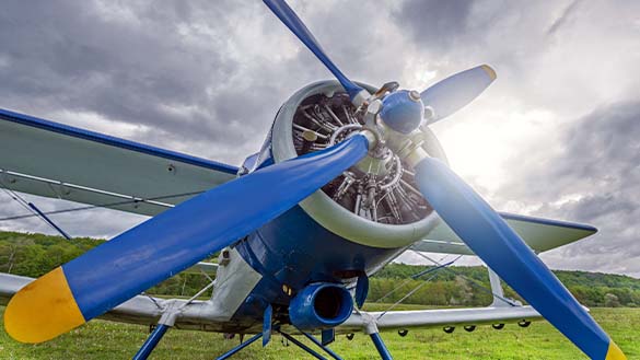 Plane with propeller spinning.