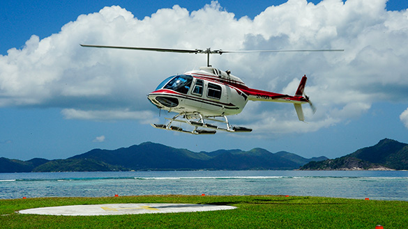 A helicopter hovering above the ground.