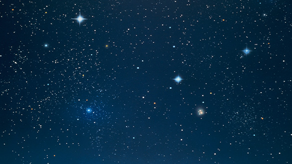 A dark sky filled with many bright twinkling lights that are stars.