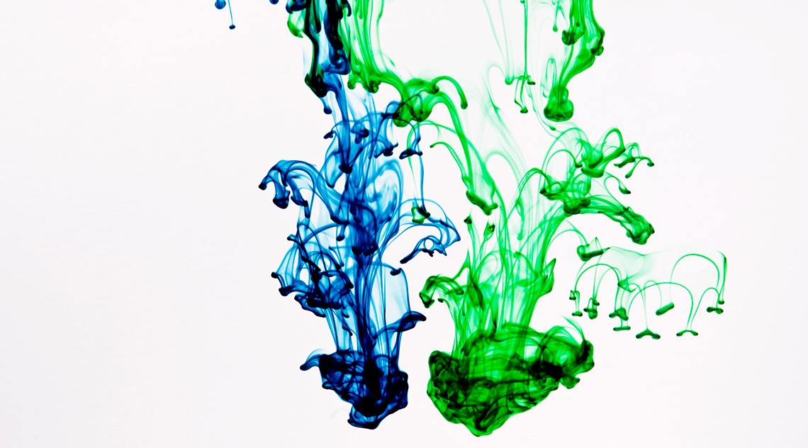 Green and blue dye added to water.