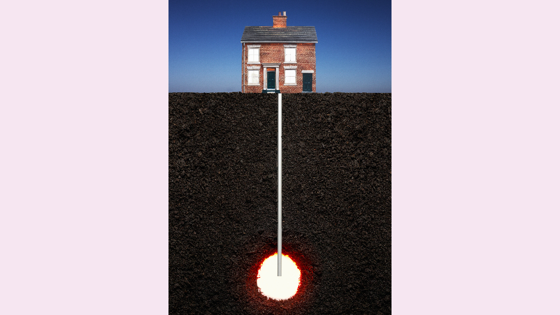 Geothermal heat pump in the ground, transferring energy back to the house as a heat source.