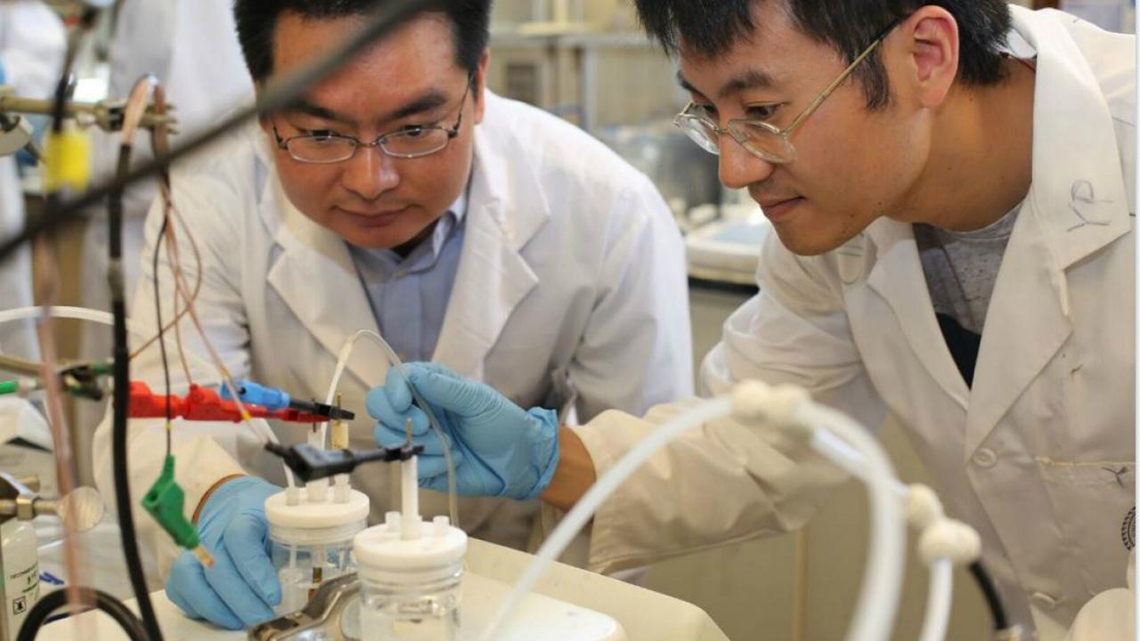 Two scientists experimenting.