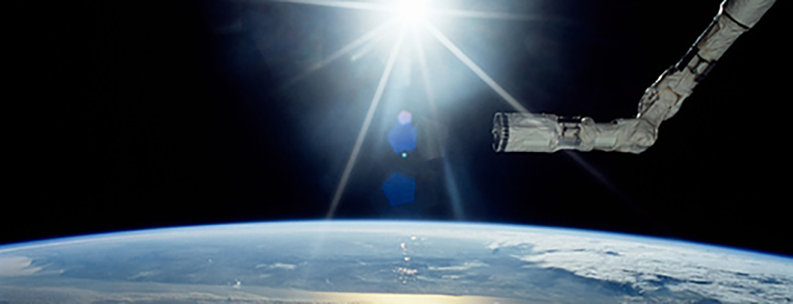 The Canadarm 2 deployed in space.