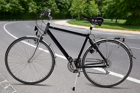 Road bicycle with two wheels and a water bottle holder.