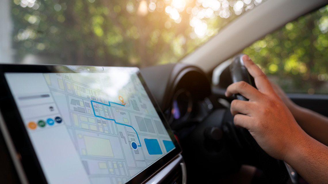 A car GPS system displaying a route for the driver.