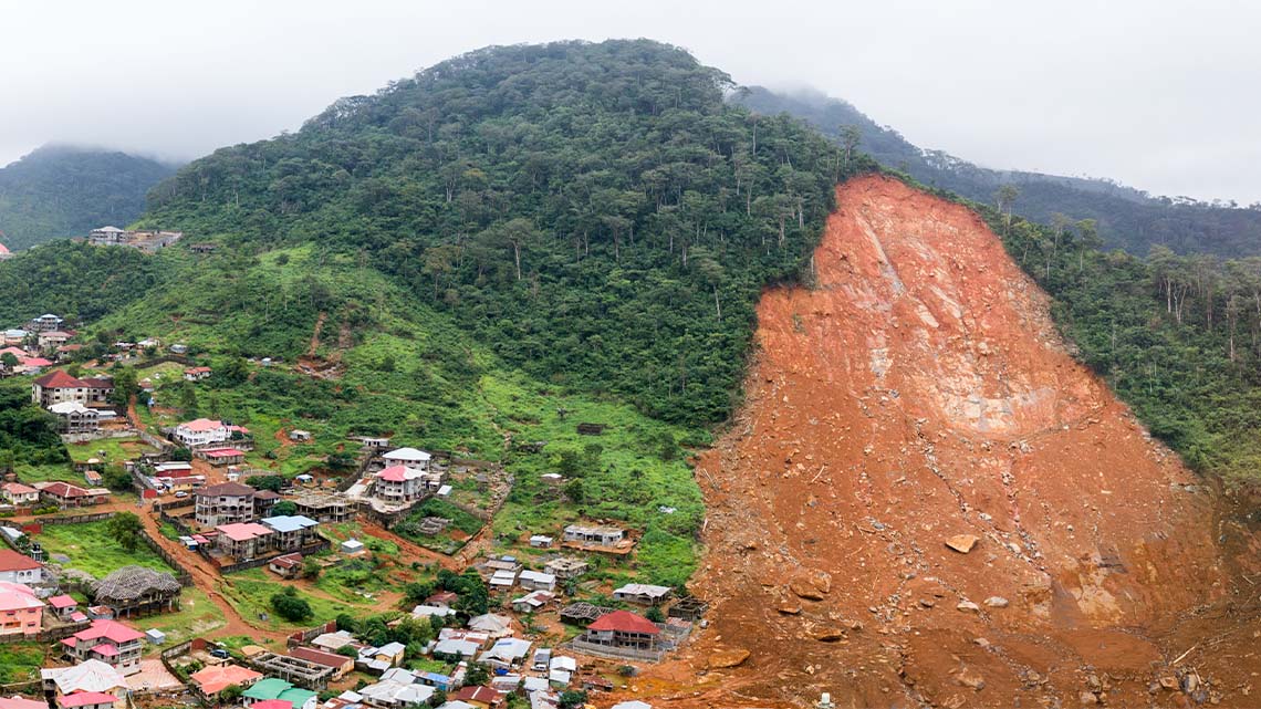 Landslide A landslide down the side of a mountain beside a residential community.