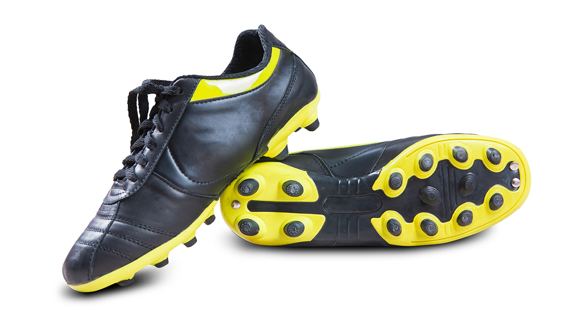 A pair of soccer cleats.