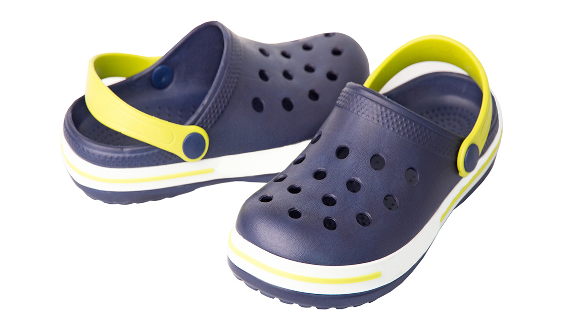 A pair of rubber slide-on sandals.