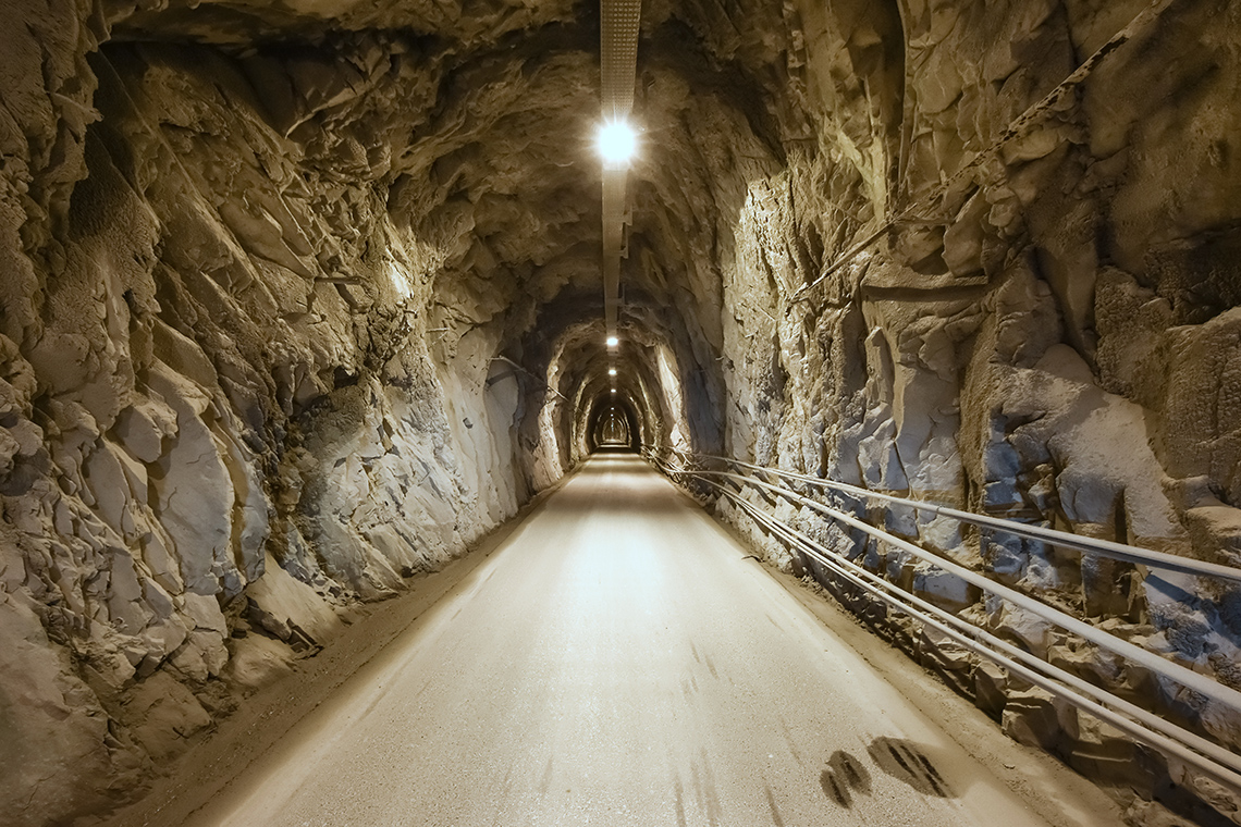 A tunnel blasted through the rock in a mine.
